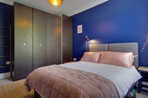 Bedroom One- click for photo gallery